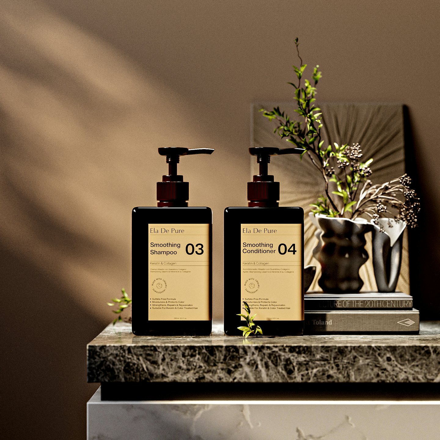 Two Ela De Pure shampoo and conditioner bottles on a countertop.